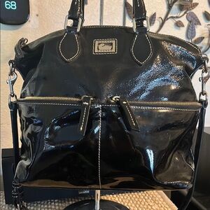 Dooney & Bourke Black Shoulder Bag with Glossy Finish and Adjustable Strap